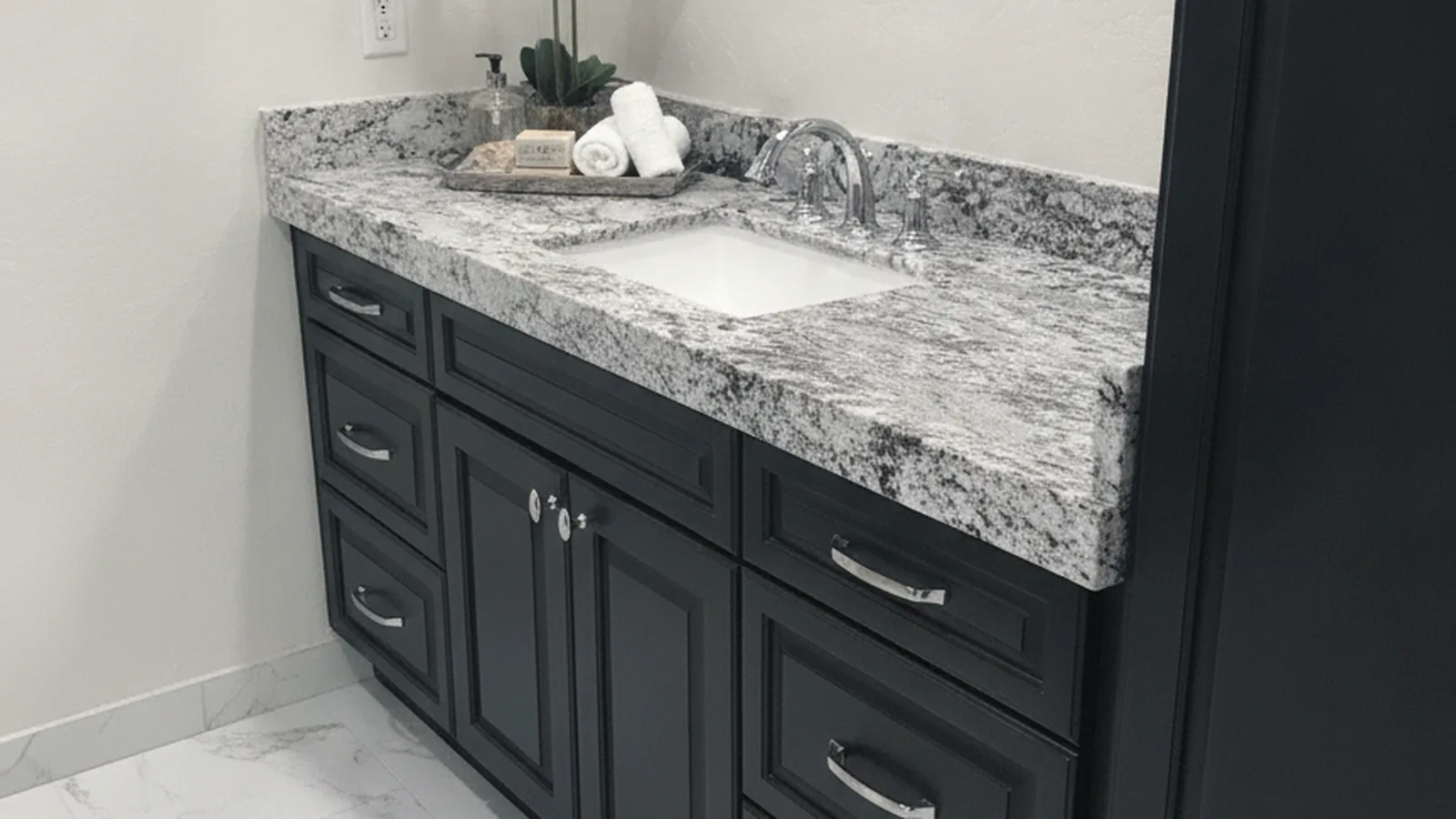 Stone vanity top being finished in the AZ Granite & Remodeling shop in Phoenix